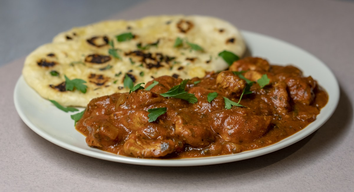 Indian curry dishes on table